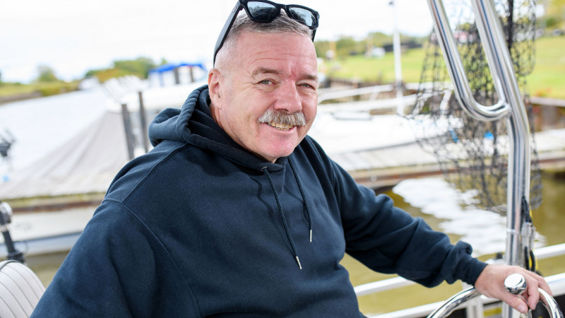 Dan fisherman and veteran on boat