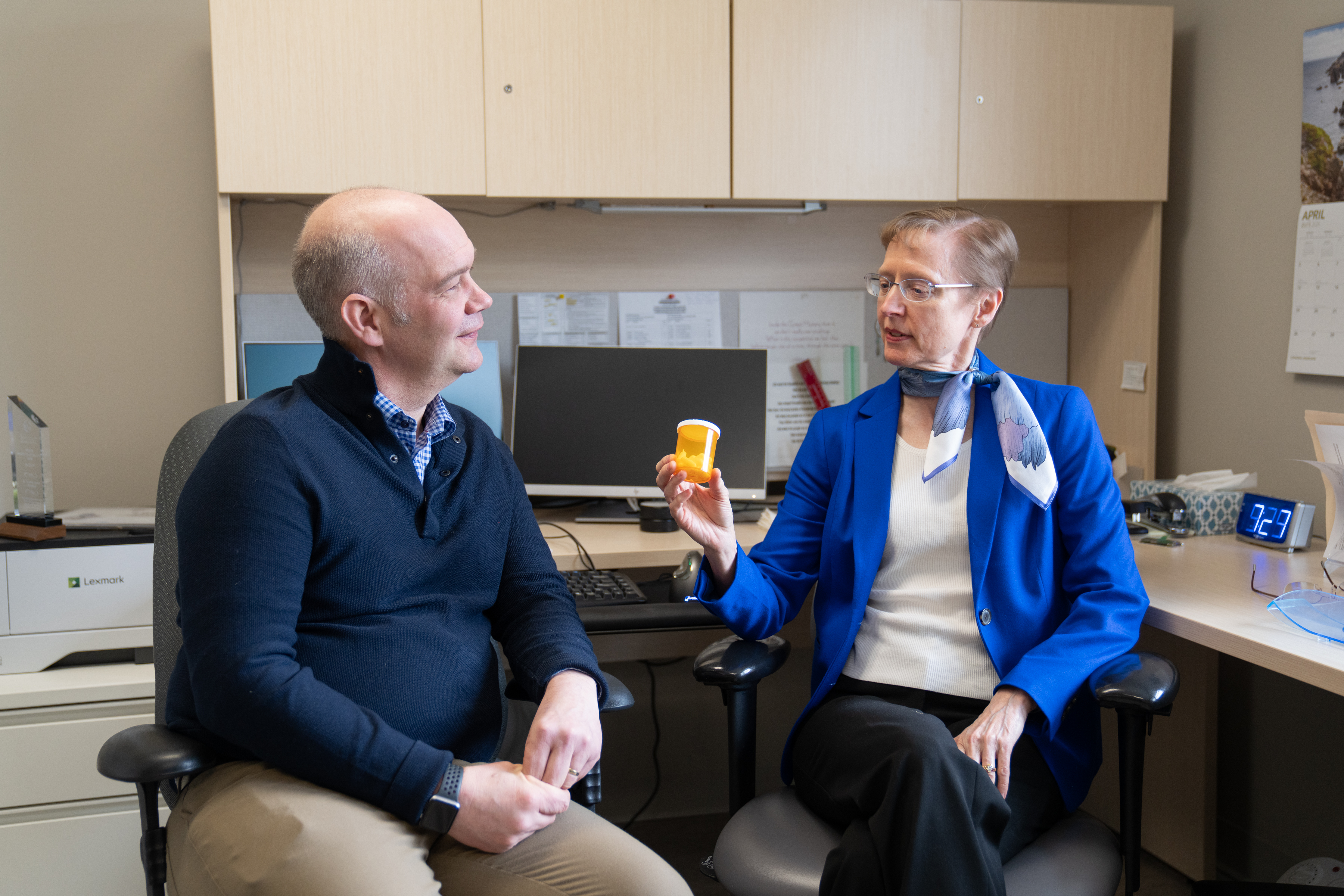 (left to right) Jeremy Burton and Dr. Osuch discussing their research.