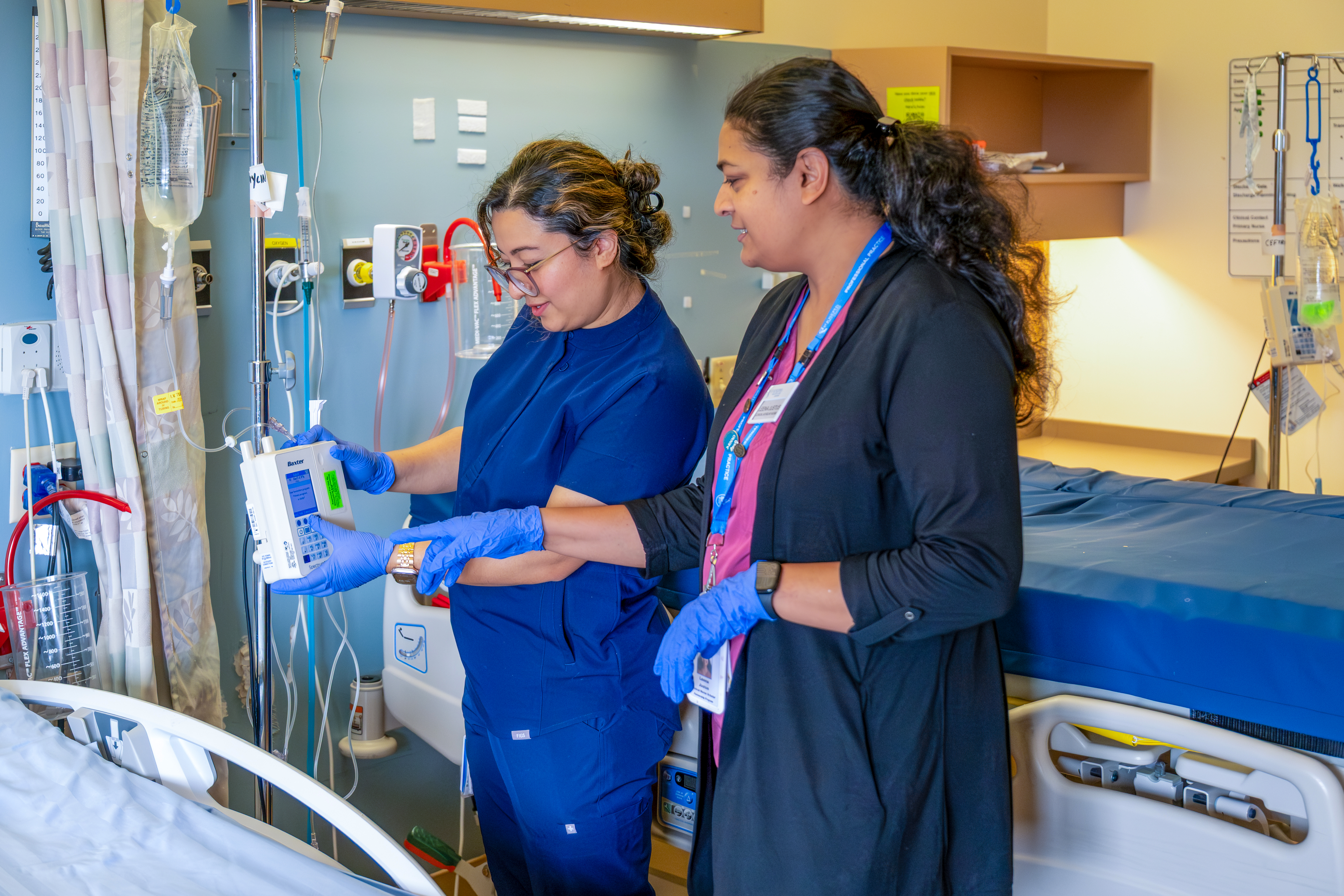 Leena Justus, a clinical scholar nurse at St. Joseph’s Parkwood Institute, mentors registered nurse Januka Thapa through a program that pairs experienced clinical scholar nurse with newly graduated nurses, internationally educated nurses, and those seeking to expand or refine their clinical skills.