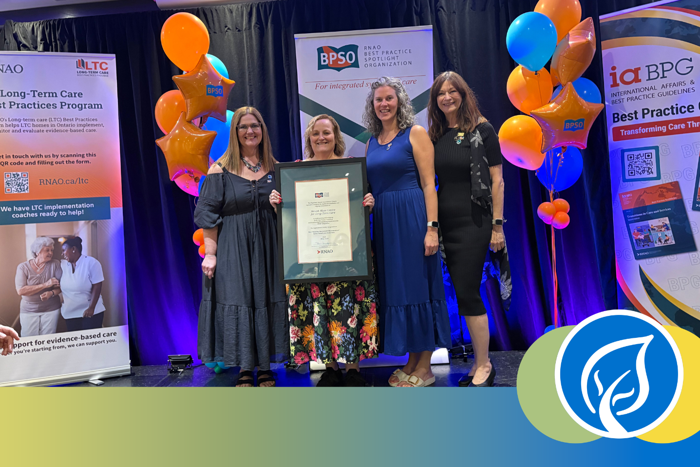 (Left to Right: Tanya Pol, Executive Director at Mount Hope; Joanne Woodfield, Quality Specialist; Katherine Plested, manager of therapeutic programs and Robin Mackie, BPSO coach from RNAO attended the May 28 ceremony to receive the official designation) 