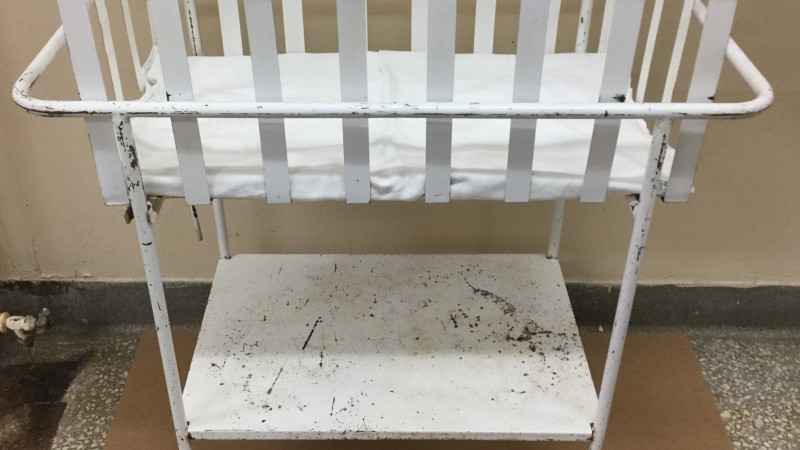 Photo of a historic bassinet used at St. Joseph's Hospital.