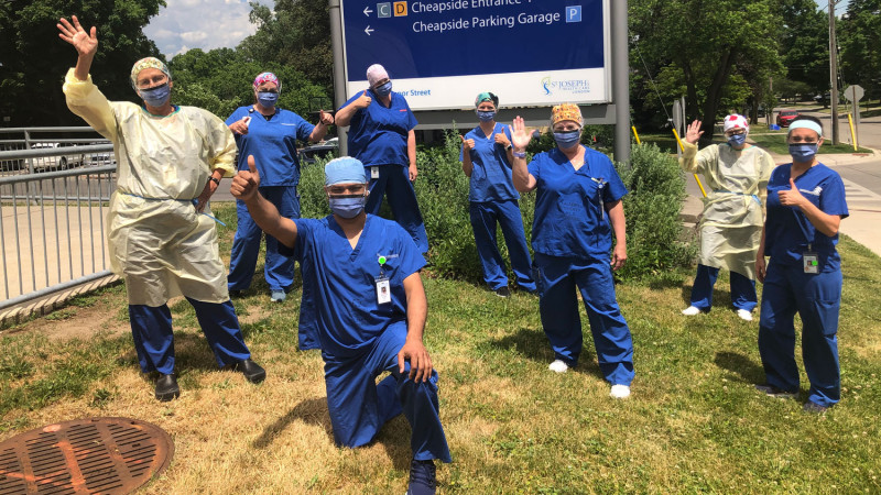 health care workers in scrubs express gratitude