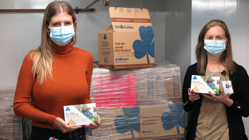 Staff with girl guide cookies