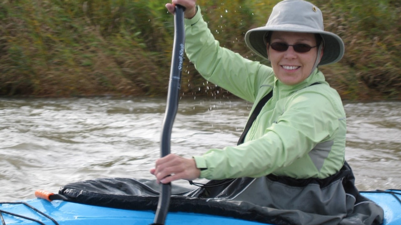 Lori paddling in a kayak