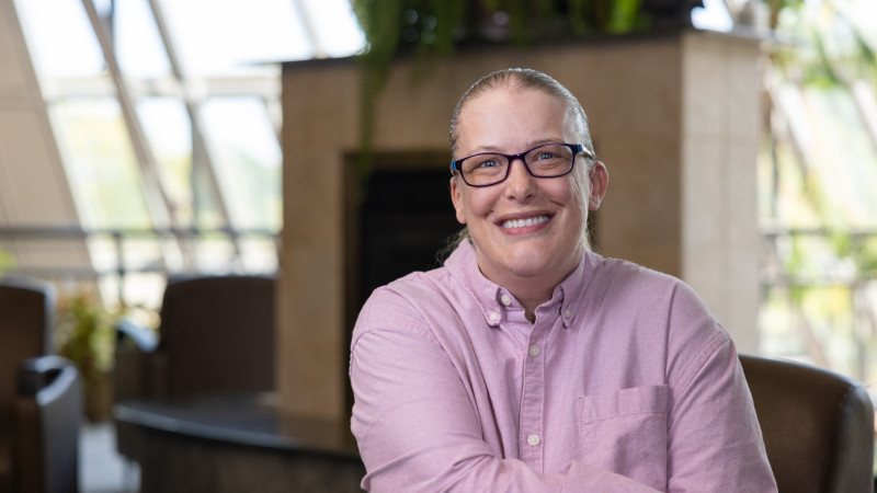 Former St. Joseph's patient Kersten Foehner sitting and smiling towards the camera