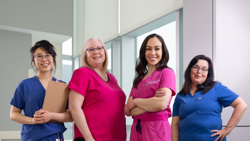 members from the breast care in their scrubs