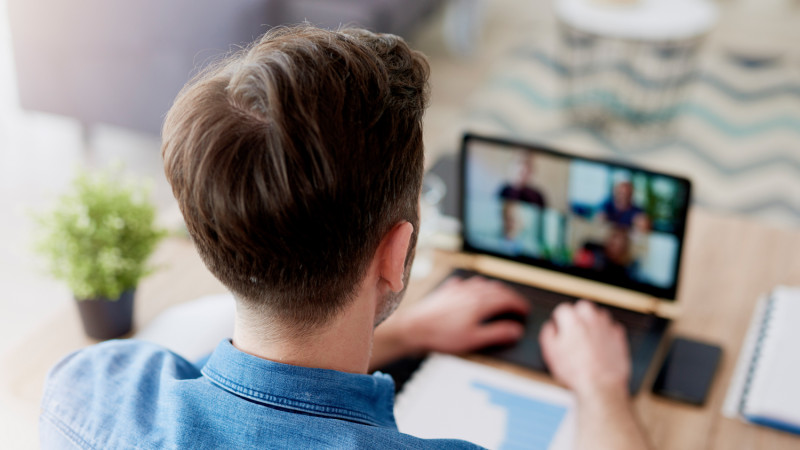 a man having a video conference at home
