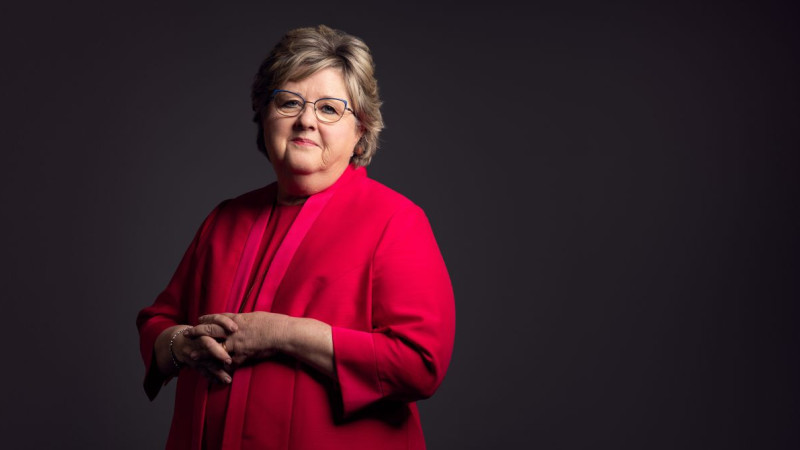 Woman Standing with hands together