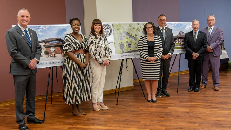 group at the homes for heroes announcement