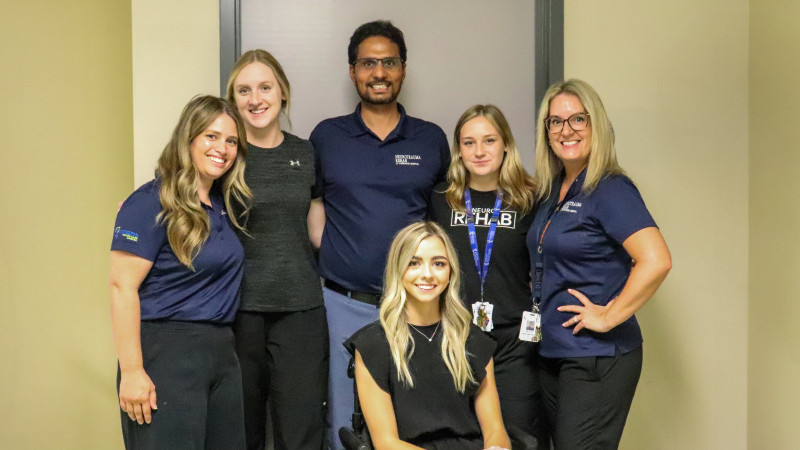 Sarah King and her care team from the NeuroTrauma Rehabilitation program