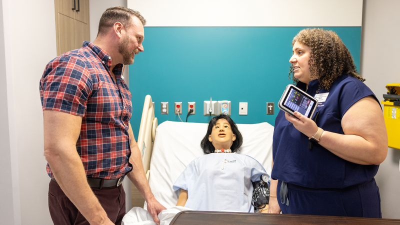 Nurse Educator Reem Gray demonstrates Nursing Anne’s capabilities in the training lab you helped to fund.