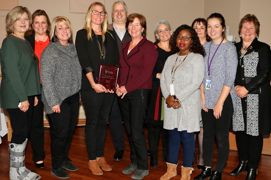 The Indwell team pose for a group photo.