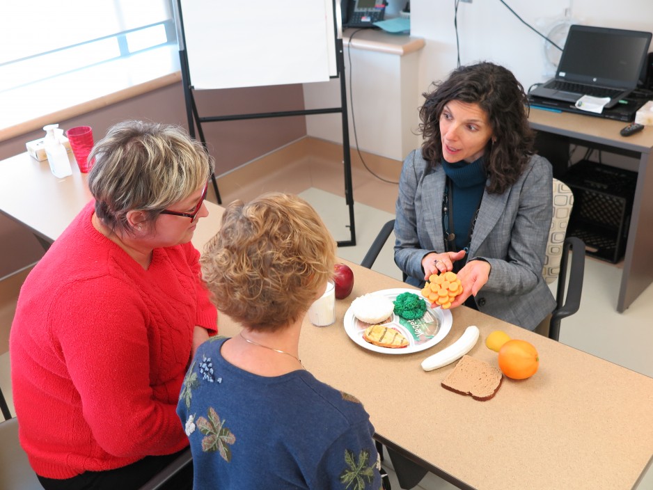 A diabetes expert helps patients manage their diet with an information session at the Diabetes Education Centre.