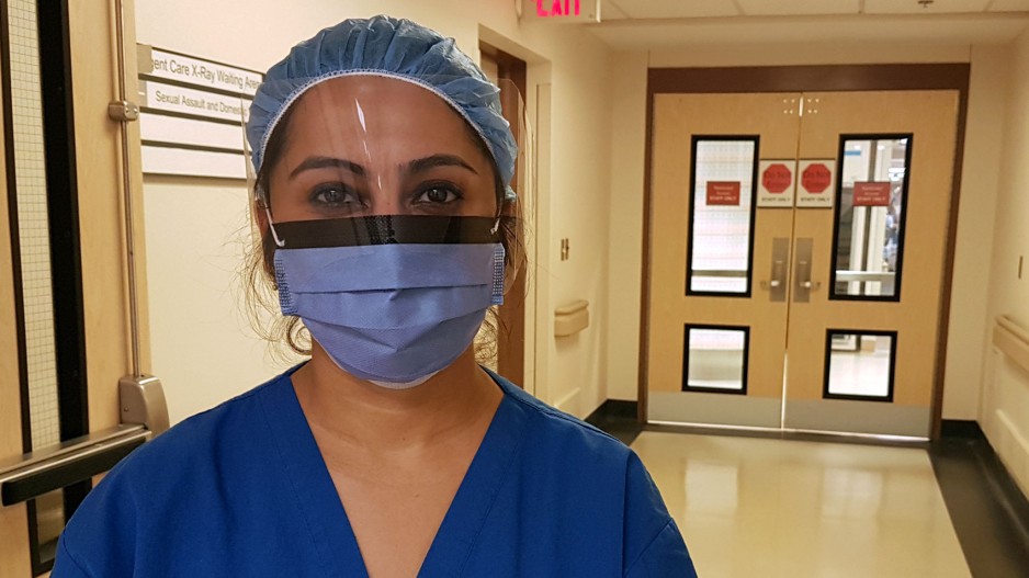 care provider wearing face shield mask