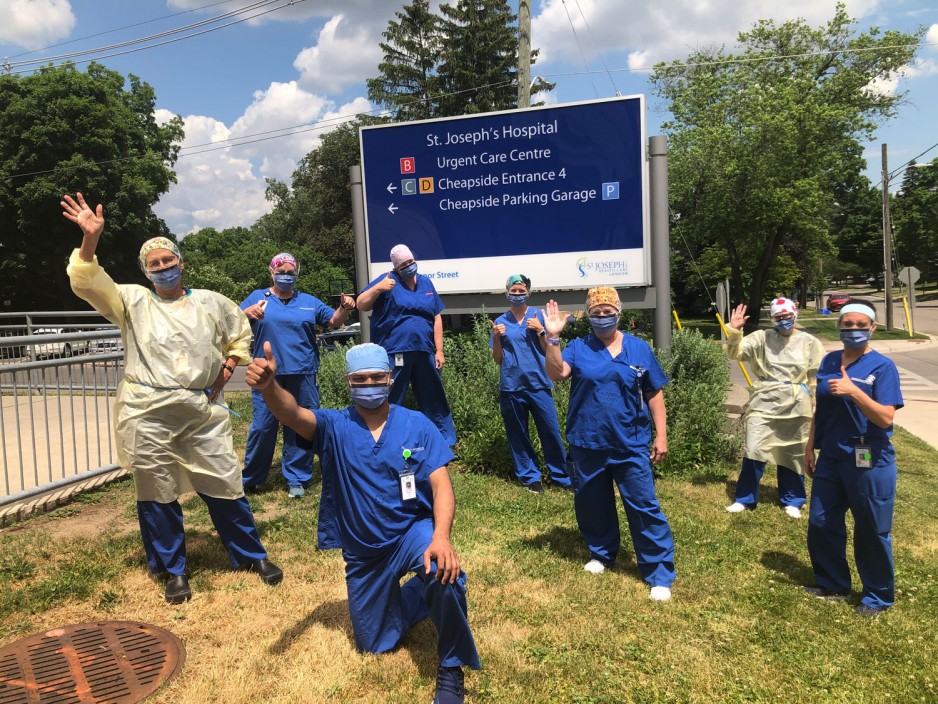health care workers in scrubs express gratitude