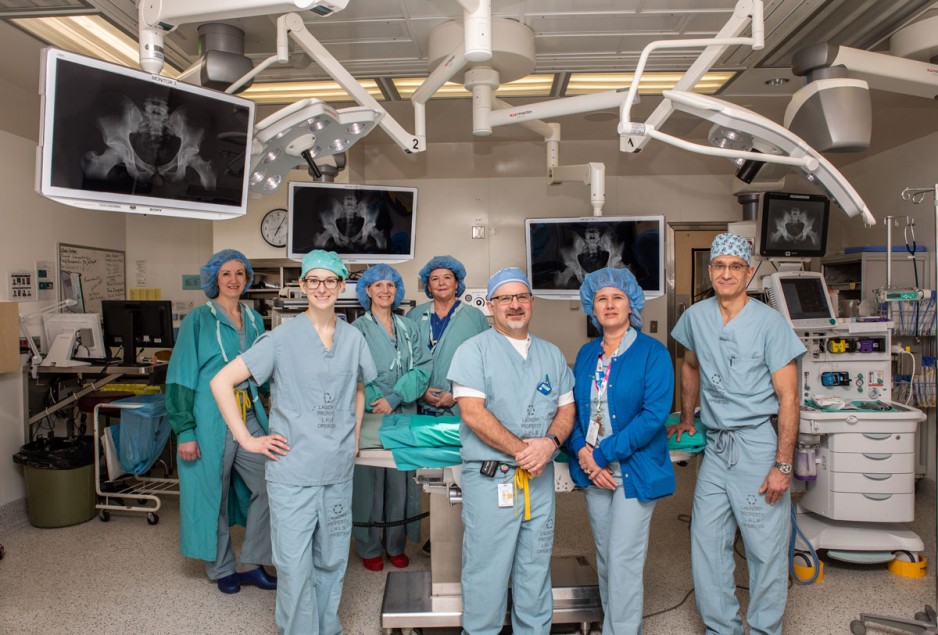 care providers wearing scrubs in the operating room