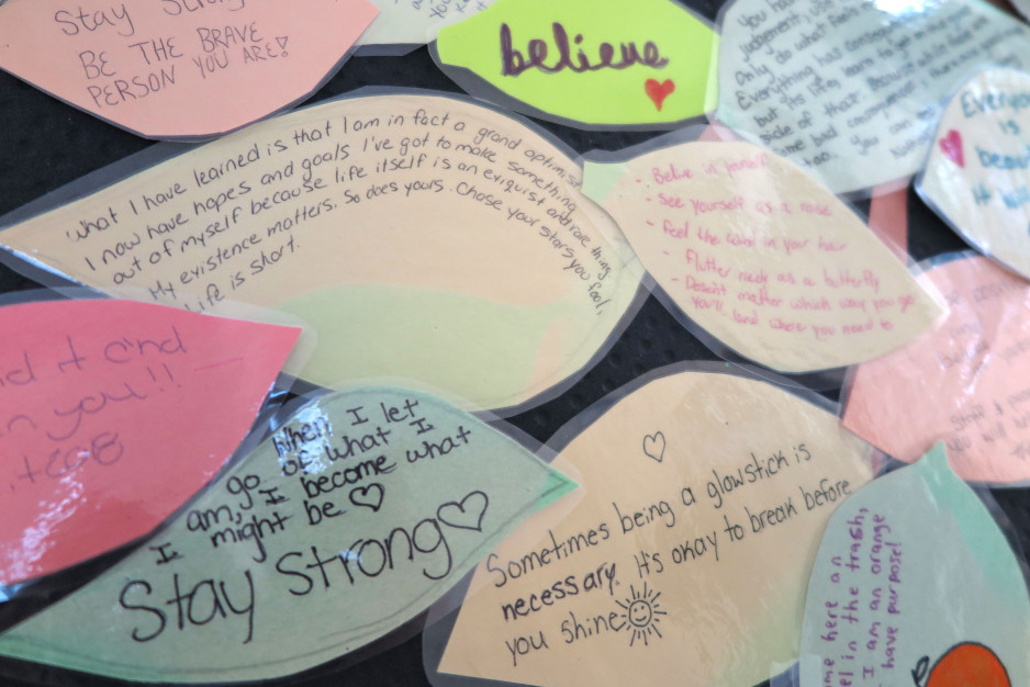a grouping of several leaves with inspirational messages like "Stay strong"