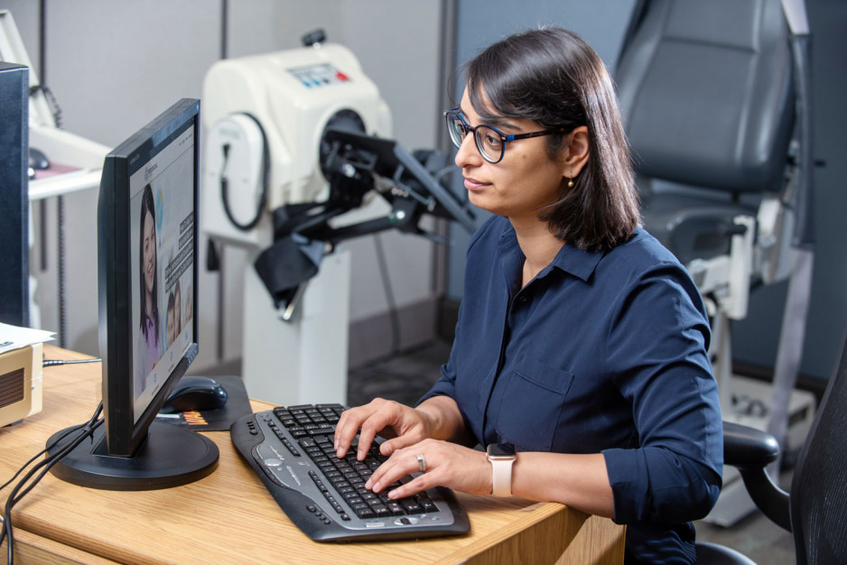 Dr. Swati Mehta typing on a keyboard