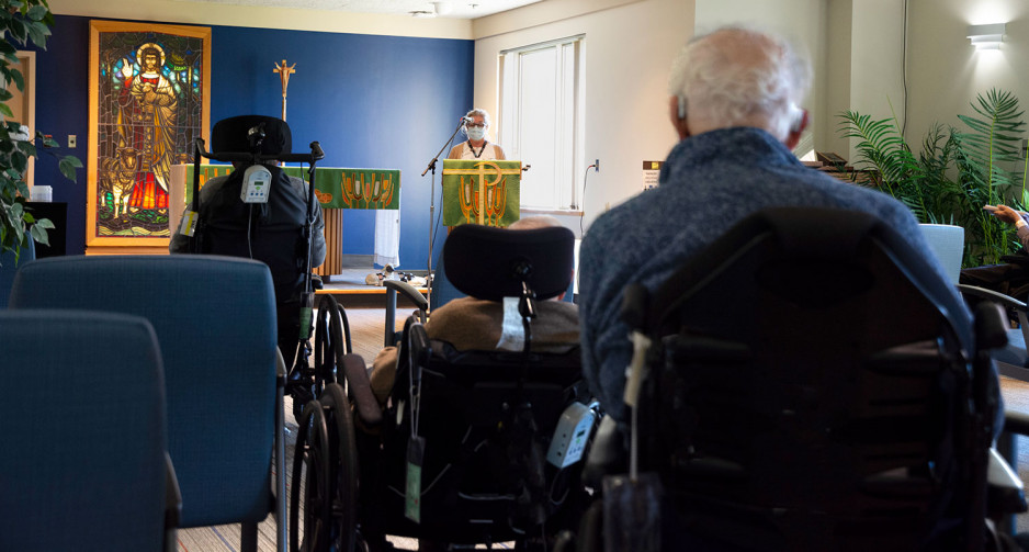 an Ecumenical service in the chapel at Parkwood Institute with veterans sitting in the seats