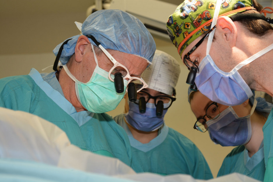 physicians performing surgery