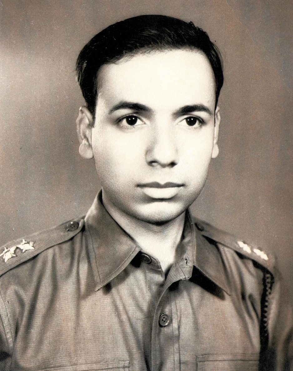 A young Dr. Mohan Merchea in military uniform