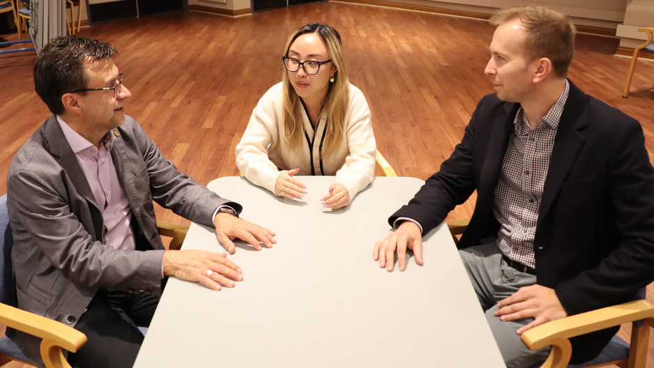 (Left to Right: Dr. Don Richardson, Jenny Liu and Anthony Nazarov discuss the findings of their research) 