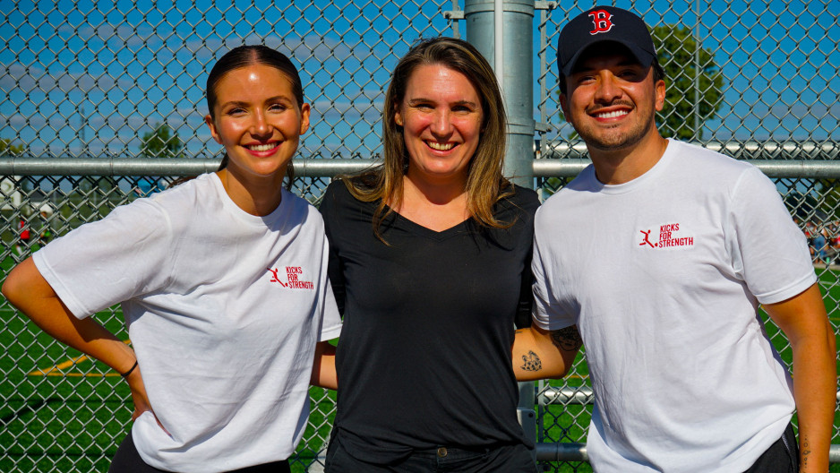 Mackenzie Machado and her family standing together