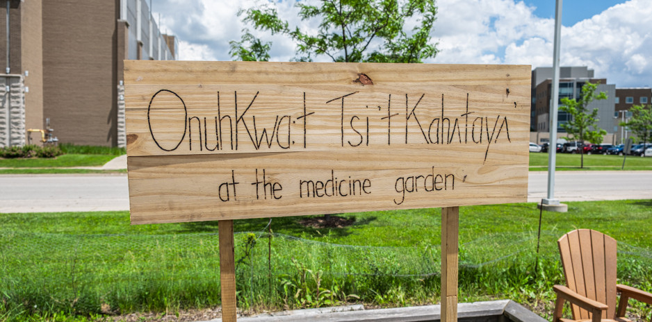 sign for indigenous garden that says "at the medicine garden"