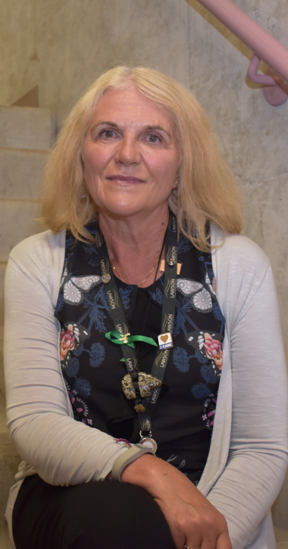 Cheryl Forchuk sitting on a staircase