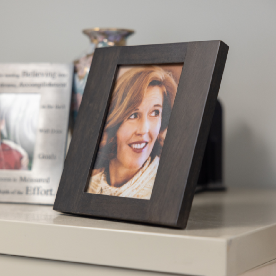 Framed Photo of Miriam Burnett on a shelf