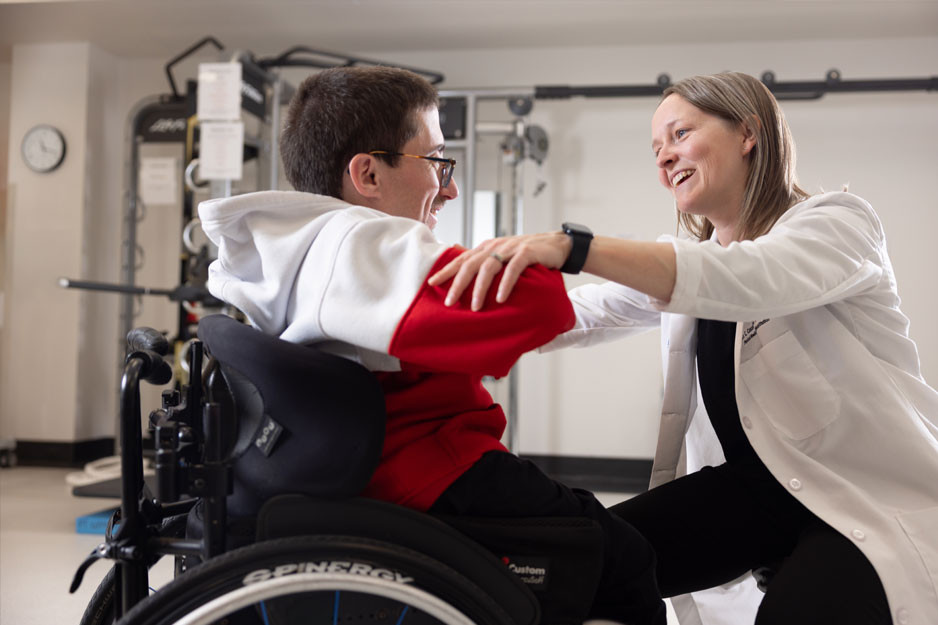 Patient in a wheel chair with a Dr