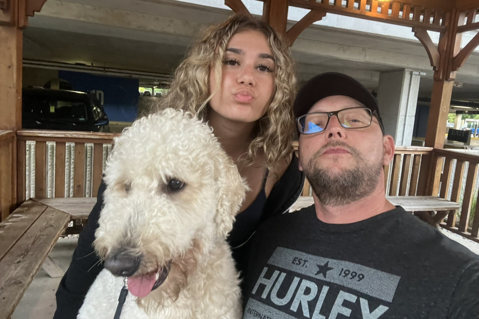 A family and their goldendoodle