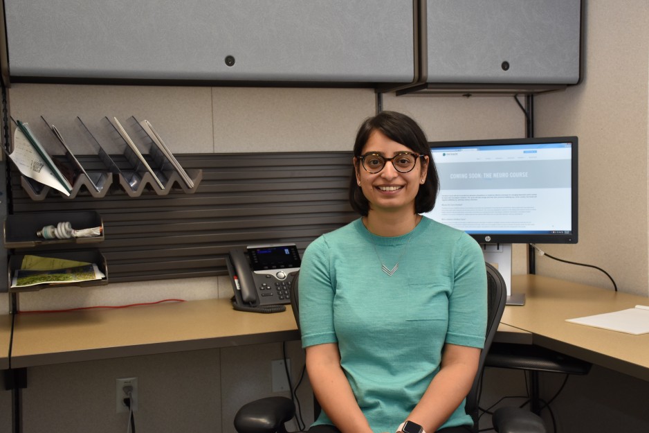 Dr. Swati Mehta poses in front of her desk.