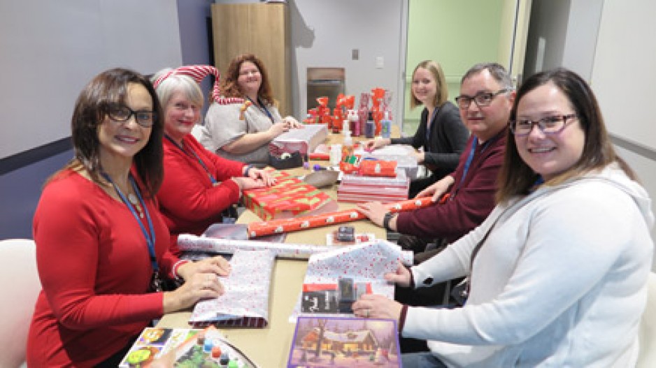 staff wrapping gifts for patients