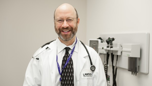 Dr. Michael Silverman poses for a photo in his clinic.