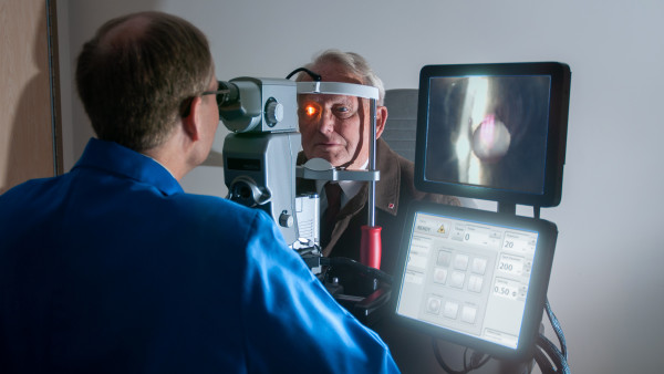 Man gets eye checkup at Ivey Eye Institute