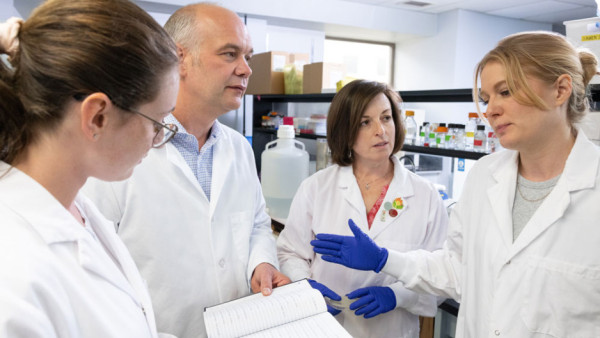 Jeremy Burton talking with colleagues