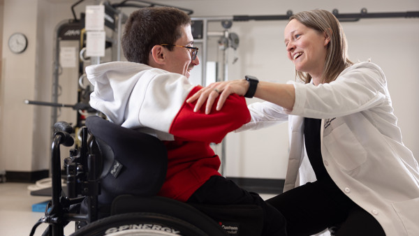 Dr. Caitlin Cassidy with Chris Madden