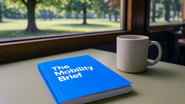 book on table titled "mobility brief"