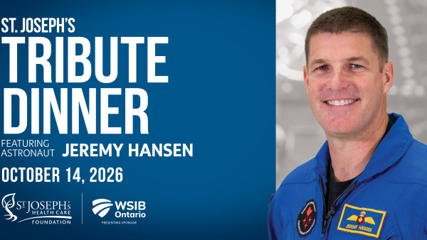 Tribute Dinner banner with astronaut Jeremy Hansen
