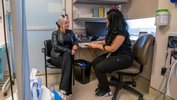 Nurse chatting with patient