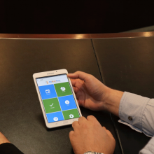 hands using an app on a phone