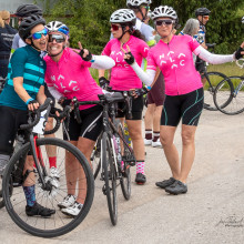 cyclists giving thumbs up