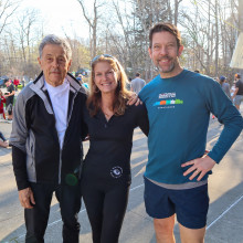 Dr. Gonder, Kim Spriet and Dr. Sheidow embracing each other