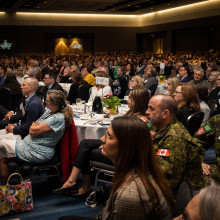 event attendees watching the stage at Breakfast of Champions