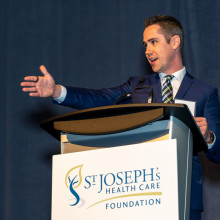 Event Chair Will Heeman at the podium