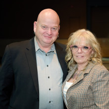 Couple enjoying themselves at Tribute Dinner