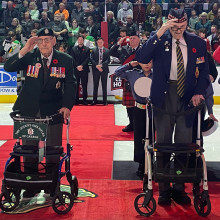 The veterans saluting on the ice
