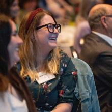 Audience members clapping
