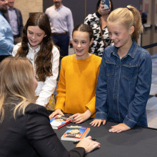 Three young fans meet Hayley Wickenheiser at book signing